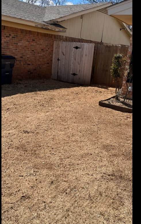 The same spot ground level and filled, ready to plant over