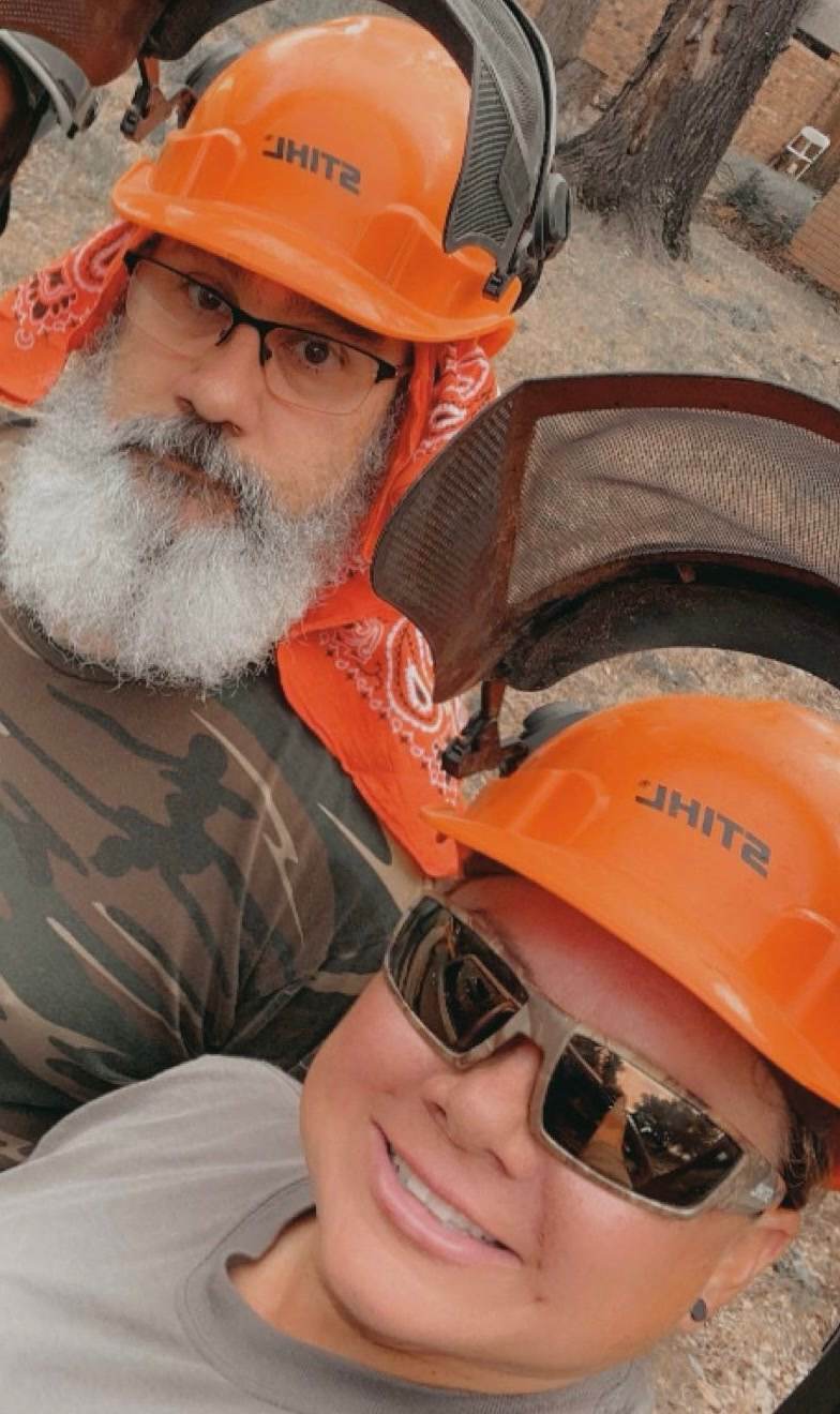 Kevin Daniels and Kat Arredondo on the job, both in Stihl hard hats